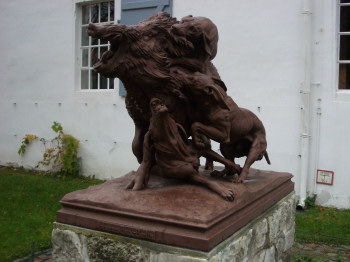 dogs munching a tasty boar